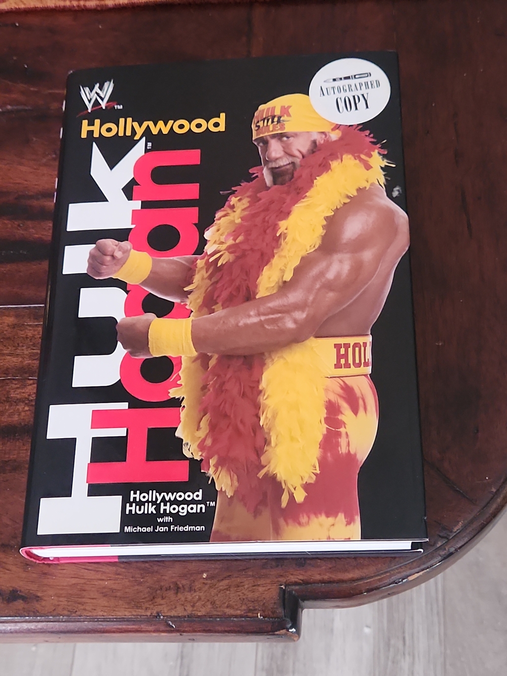 Hollywood Hulk Hogan Autographed Book - Red & Yellow Cover